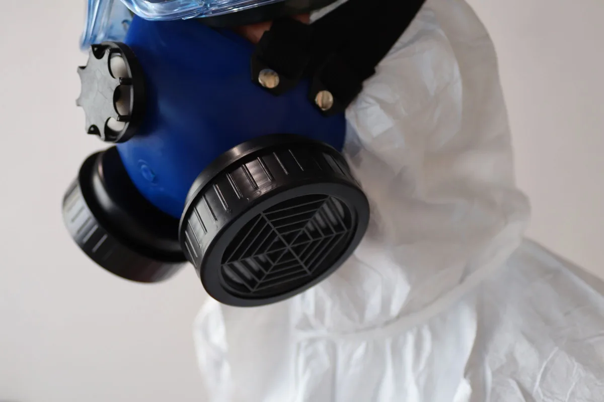 Respirator and protective suit for mold remediation